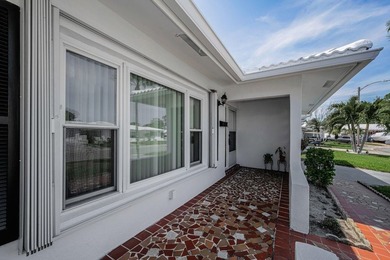 This charming home offers approximately 1,450 square feet of on Mainlands Golf Club in Florida - for sale on GolfHomes.com, golf home, golf lot