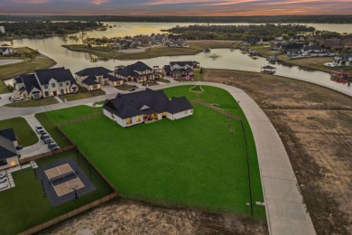 Welcome to your dream home in The Resort, the only 24-7 gated on The Golf Club at Resort Eagle Mountain Lake in Texas - for sale on GolfHomes.com, golf home, golf lot