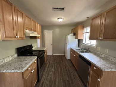 2Bed/1bath Quad overlooking Hilamin Golf Course several long on Hilaman Park Golf Course in Florida - for sale on GolfHomes.com, golf home, golf lot