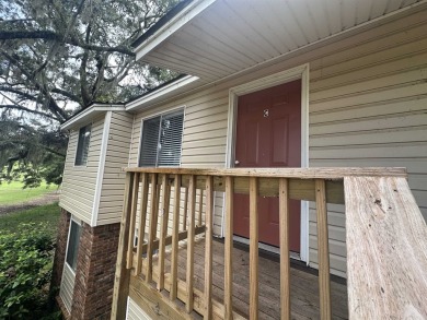 2Bed/1bath Quad overlooking Hilamin Golf Course several long on Hilaman Park Golf Course in Florida - for sale on GolfHomes.com, golf home, golf lot