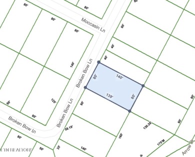 Discover a beautiful wooded corner lot slooped with on Lake Tansi Village Country Club in Tennessee - for sale on GolfHomes.com, golf home, golf lot