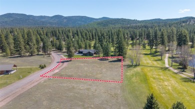Located just outside the quaint town of Seeley Lake, this on Double Arrow Lodge in Montana - for sale on GolfHomes.com, golf home, golf lot