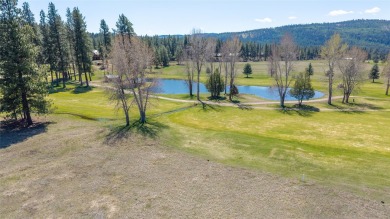 Located just outside the quaint town of Seeley Lake, this on Double Arrow Lodge in Montana - for sale on GolfHomes.com, golf home, golf lot