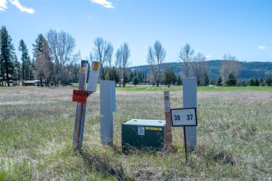 Located just outside the quaint town of Seeley Lake, this on Double Arrow Lodge in Montana - for sale on GolfHomes.com, golf home, golf lot