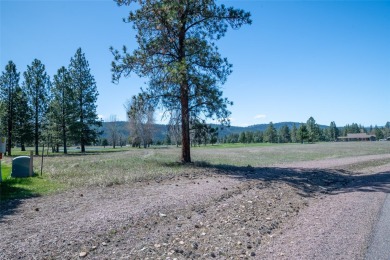 Located just outside the quaint town of Seeley Lake, this on Double Arrow Lodge in Montana - for sale on GolfHomes.com, golf home, golf lot