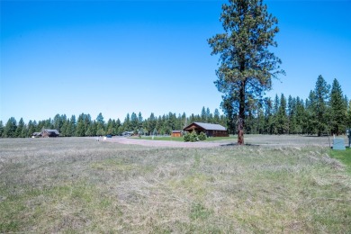 Located just outside the quaint town of Seeley Lake, this on Double Arrow Lodge in Montana - for sale on GolfHomes.com, golf home, golf lot