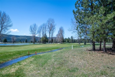 Located just outside the quaint town of Seeley Lake, this on Double Arrow Lodge in Montana - for sale on GolfHomes.com, golf home, golf lot