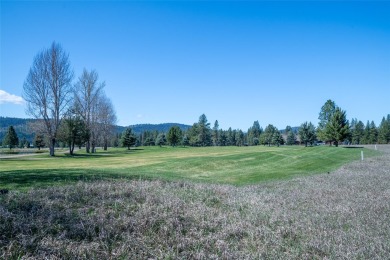 Located just outside the quaint town of Seeley Lake, this on Double Arrow Lodge in Montana - for sale on GolfHomes.com, golf home, golf lot