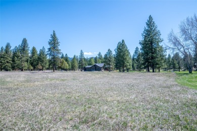 Located just outside the quaint town of Seeley Lake, this on Double Arrow Lodge in Montana - for sale on GolfHomes.com, golf home, golf lot