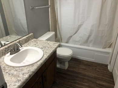 2Bed/1bath Quad overlooking Hilamin Golf Course fully on Hilaman Park Golf Course in Florida - for sale on GolfHomes.com, golf home, golf lot