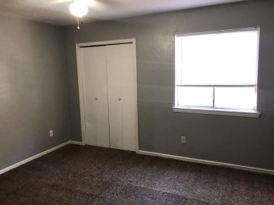 2Bed/1bath Quad overlooking Hilamin Golf Course fully on Hilaman Park Golf Course in Florida - for sale on GolfHomes.com, golf home, golf lot