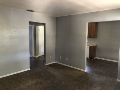 2Bed/1bath Quad overlooking Hilamin Golf Course fully on Hilaman Park Golf Course in Florida - for sale on GolfHomes.com, golf home, golf lot