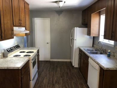 2Bed/1bath Quad overlooking Hilamin Golf Course fully on Hilaman Park Golf Course in Florida - for sale on GolfHomes.com, golf home, golf lot