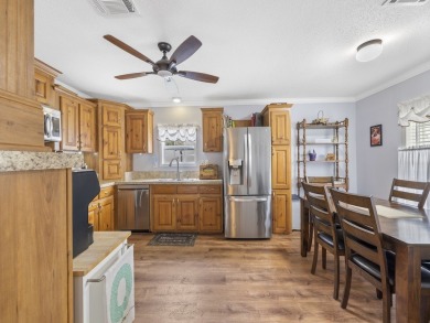 Built in 2017, this gorgeous 3/2 residence features beautiful on Barefoot Bay Golf Course in Florida - for sale on GolfHomes.com, golf home, golf lot