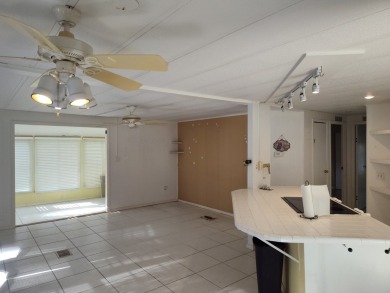 CALLING ALL FLIPPERS**LAKESIDE FIXER UPPER** NEEDS A/C AND A on Vista Plantation Golf Club in Florida - for sale on GolfHomes.com, golf home, golf lot