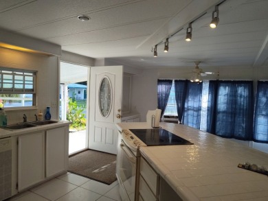 CALLING ALL FLIPPERS**LAKESIDE FIXER UPPER** NEEDS A/C AND A on Vista Plantation Golf Club in Florida - for sale on GolfHomes.com, golf home, golf lot