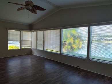 CALLING ALL FLIPPERS**LAKESIDE FIXER UPPER** NEEDS A/C AND A on Vista Plantation Golf Club in Florida - for sale on GolfHomes.com, golf home, golf lot