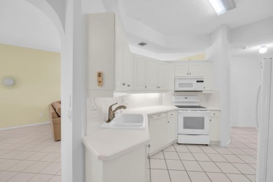 Fabulous opportunity for first floor living in a spacious condo on Wycliffe Golf and Country Club in Florida - for sale on GolfHomes.com, golf home, golf lot