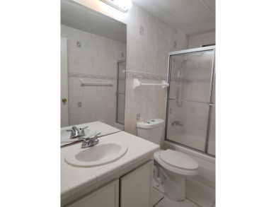 CALLING ALL FLIPPERS**LAKESIDE FIXER UPPER** NEEDS A/C AND A on Vista Plantation Golf Club in Florida - for sale on GolfHomes.com, golf home, golf lot