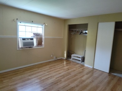 CALLING ALL FLIPPERS**LAKESIDE FIXER UPPER** NEEDS A/C AND A on Vista Plantation Golf Club in Florida - for sale on GolfHomes.com, golf home, golf lot