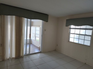 CALLING ALL FLIPPERS**LAKESIDE FIXER UPPER** NEEDS A/C AND A on Vista Plantation Golf Club in Florida - for sale on GolfHomes.com, golf home, golf lot