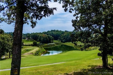 This charming Craftsman-style home, nestled in a prime location on Tan-Tar-A Golf Club in Missouri - for sale on GolfHomes.com, golf home, golf lot