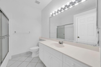 Fabulous opportunity for first floor living in a spacious condo on Wycliffe Golf and Country Club in Florida - for sale on GolfHomes.com, golf home, golf lot