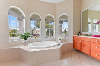 Welcome to your dream pool home in the prestigious Madison Green on The Links At Madison Green in Florida - for sale on GolfHomes.com, golf home, golf lot