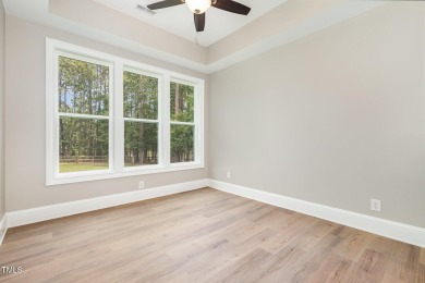 Gorgeous Waterfront Home with the Woods 18 hole Golf Course on Whispering Pines Golf Course in North Carolina - for sale on GolfHomes.com, golf home, golf lot