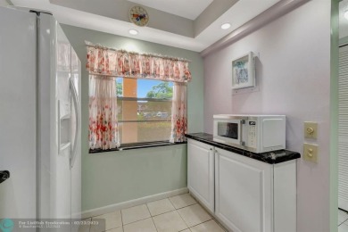 *REDUCED MOTIVATED SELLER* Charming 1-Bed, 1-Bath with Garden on Wynmoor Golf Course in Florida - for sale on GolfHomes.com, golf home, golf lot