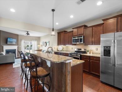 Welcome to this beautifully maintained two-story townhouse in on Plantation Lakes Golf and Country Club in Delaware - for sale on GolfHomes.com, golf home, golf lot