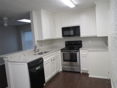 AFFORDABLE 2 bedroom 2 bath townhome is centrally located for on Prairie Lakes Golf Club in Texas - for sale on GolfHomes.com, golf home, golf lot