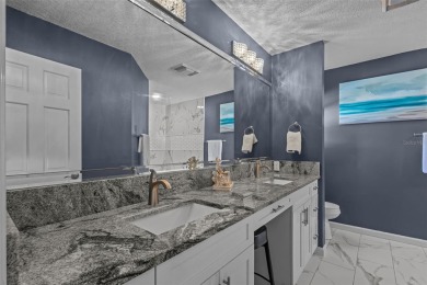 Under contract-accepting backup offers. Welcome to luxury living on East Lake Woodlands Country Club in Florida - for sale on GolfHomes.com, golf home, golf lot