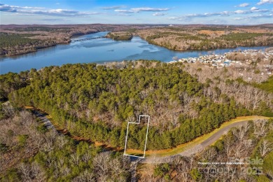 Located in the prestigious gated community of Heron Bay, this on Old North State Club at Uwharrie Point Golf community in North Carolina - for sale on GolfHomes.com, golf home, golf lot