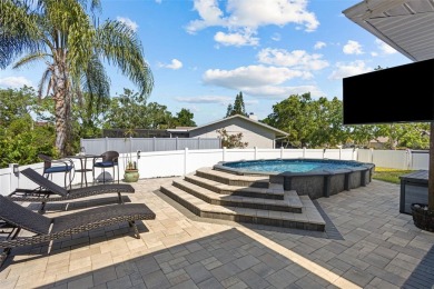 Under contract-accepting backup offers. Welcome to luxury living on East Lake Woodlands Country Club in Florida - for sale on GolfHomes.com, golf home, golf lot