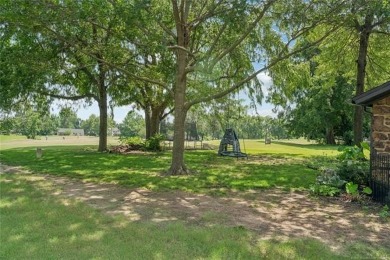 Single story home with incredible views of Indian Springs golf on Indian Springs Country Club in Oklahoma - for sale on GolfHomes.com, golf home, golf lot
