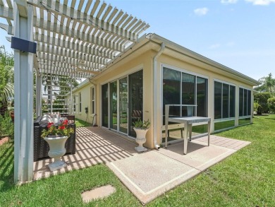 Exceptional 3/2 Concrete, Block and Stucco Designer Gardenia on The Links of Spruce Creek in Florida - for sale on GolfHomes.com, golf home, golf lot