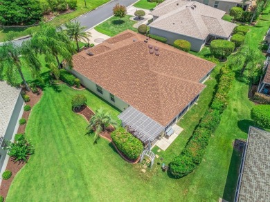 Exceptional 3/2 Concrete, Block and Stucco Designer Gardenia on The Links of Spruce Creek in Florida - for sale on GolfHomes.com, golf home, golf lot