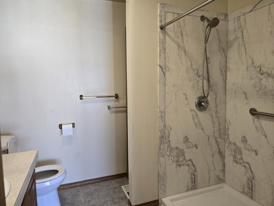 Golf course living on Thunder Bay Golf Course overlooking Hole on Thunder Bay Golf Resort in Michigan - for sale on GolfHomes.com, golf home, golf lot