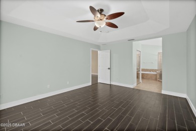 Located within the highly sought-after, guard-gated community of on Plantation Bay Golf and Country Club in Florida - for sale on GolfHomes.com, golf home, golf lot