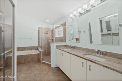Located within the highly sought-after, guard-gated community of on Plantation Bay Golf and Country Club in Florida - for sale on GolfHomes.com, golf home, golf lot