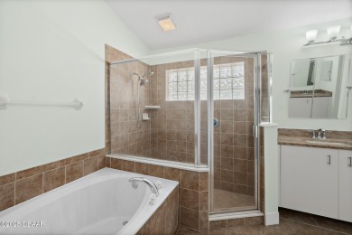 Located within the highly sought-after, guard-gated community of on Plantation Bay Golf and Country Club in Florida - for sale on GolfHomes.com, golf home, golf lot