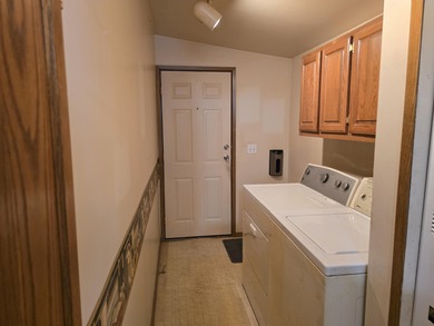 Golf course living on Thunder Bay Golf Course overlooking Hole on Thunder Bay Golf Resort in Michigan - for sale on GolfHomes.com, golf home, golf lot