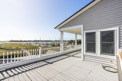 UNPARALLELED VISTAS OF RIVER, MARSH AND SEA -- With views on The Lakes Country Club in North Carolina - for sale on GolfHomes.com, golf home, golf lot