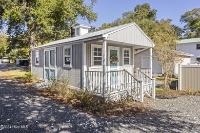 UNPARALLELED VISTAS OF RIVER, MARSH AND SEA -- With views on The Lakes Country Club in North Carolina - for sale on GolfHomes.com, golf home, golf lot