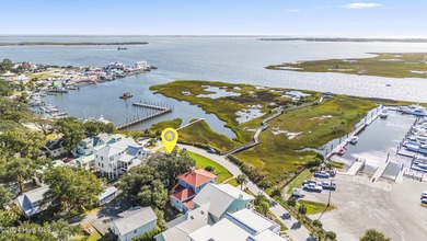 UNPARALLELED VISTAS OF RIVER, MARSH AND SEA -- With views on The Lakes Country Club in North Carolina - for sale on GolfHomes.com, golf home, golf lot