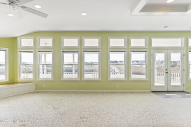 UNPARALLELED VISTAS OF RIVER, MARSH AND SEA -- With views on The Lakes Country Club in North Carolina - for sale on GolfHomes.com, golf home, golf lot