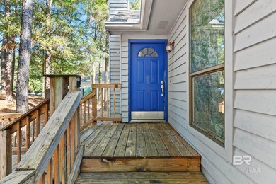 Looking for a home that feels like a cozy retreat tucked away in on Lake Forest Yacht and Country Club in Alabama - for sale on GolfHomes.com, golf home, golf lot