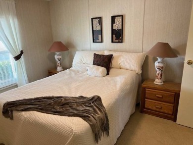 Discover this beautifully furnished 3-bedroom, 2-bathroom home on Crystal Lake Club in Florida - for sale on GolfHomes.com, golf home, golf lot