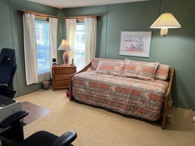 Discover this beautifully furnished 3-bedroom, 2-bathroom home on Crystal Lake Club in Florida - for sale on GolfHomes.com, golf home, golf lot